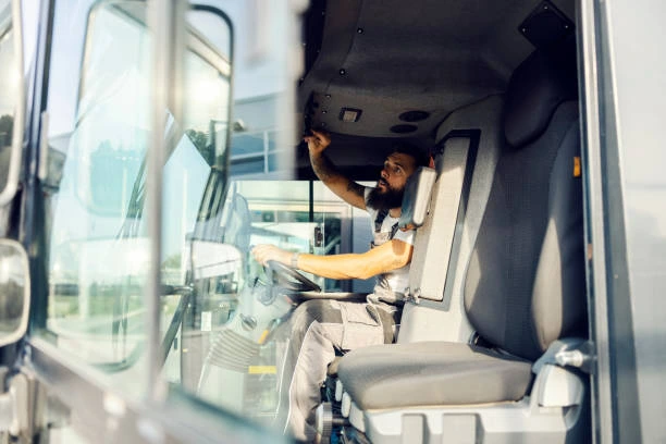 Fleetway Service & Repair technician running in-cab performance diagnostics before returning a repaired diesel truck to the customer.